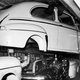 Picture taken in 1946 at Detroit showing workers in action on an assembly line in the Ford factory.